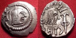 HIMYAR KINGDOM (The Homerites) AR silver scyphate 'quinarius'. 125-150 AD, under Shamnar Yahan'am. Head of deity / head of ru...